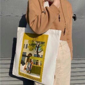 Louis Vuitton White Canvas Tote with Yellow and Orange 'V' Graphic